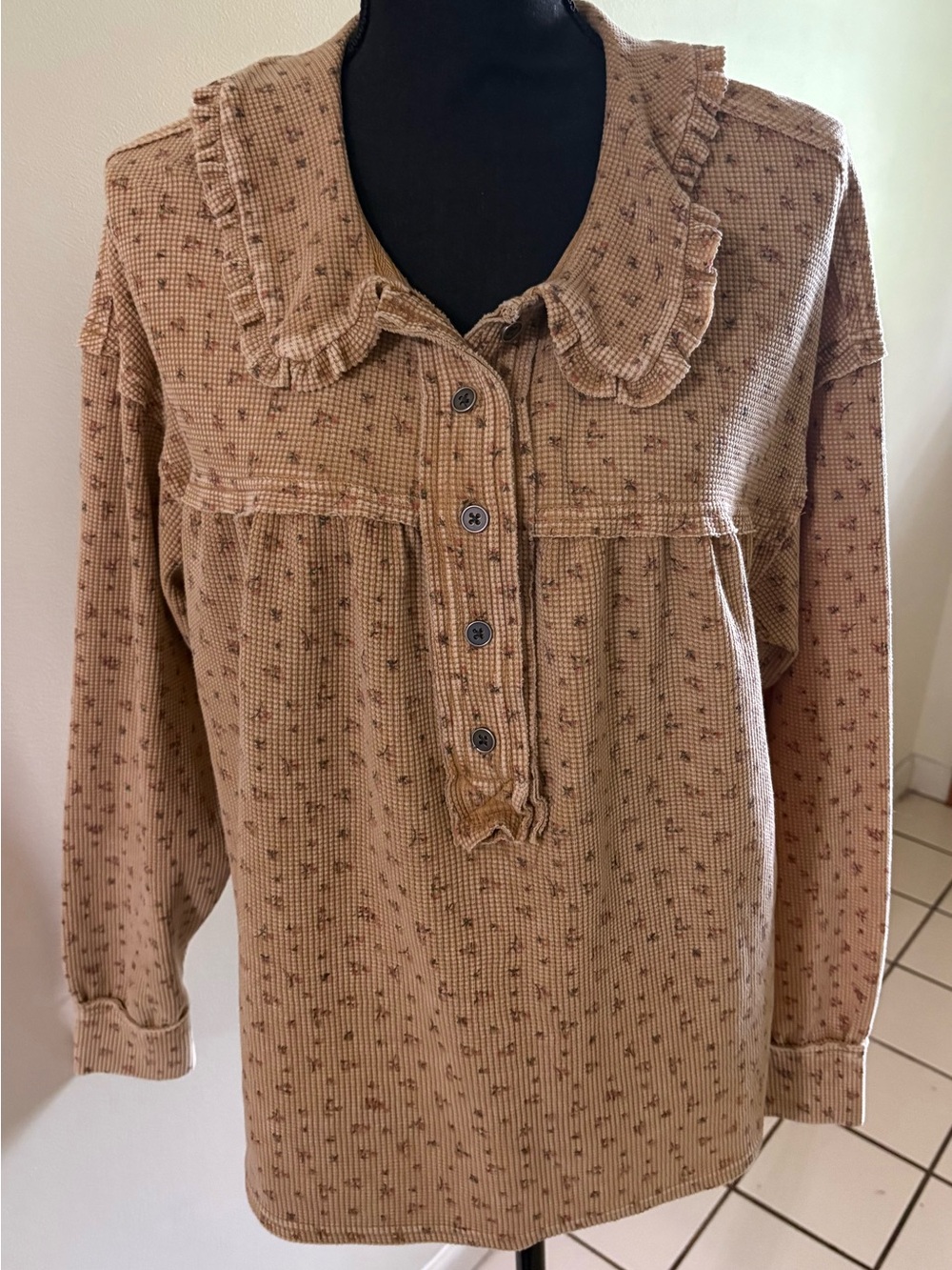 easel Long Sleeve Ruffled Collar Pullover in Tan with Subtle Print